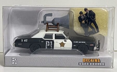 Brekina: Dodge Monaco mit Mega-Lautsprecher "J & E" und Figuren